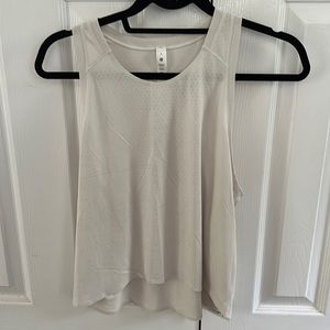 Size 8, new with tags. Lululemon fast and free race length tank.